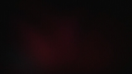 A dark and mysterious image with a subtle hint of red, creating an atmosphere of intrigue and suspense, perfect for conveying a sense of secrecy