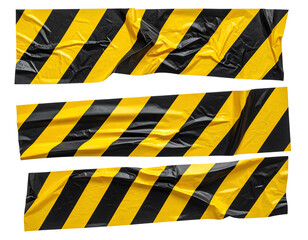 Two strips of wrinkled yellow and black striped caution tape for restricted areas. Is