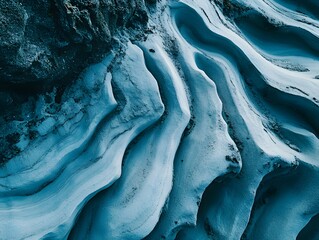 Fototapeta premium Abstract Blue Sand Dune Texture Background, Swirling Sand Patterns, Natural Stone Formation