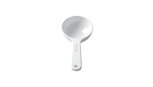 White plastic measuring cup on a black background, viewed from overhead