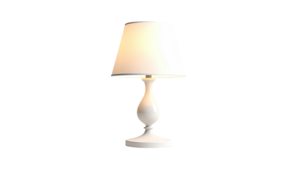 Elegant white bedside lamp with a glowing shade, isolated on black