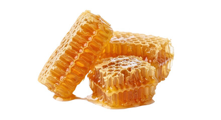 Isolated chunks of fresh honeycomb with honey dripping, sweet and delicious food item