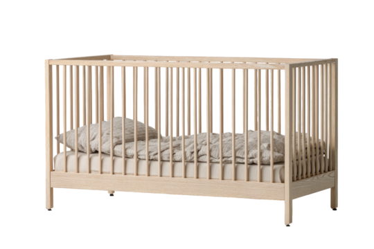 Light wood crib, bedding inside. Nursery ready