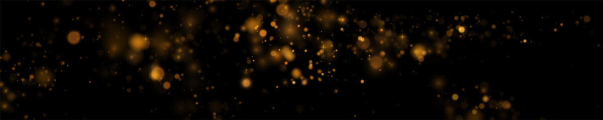 Festive gold sparkles, starbursts and shimmering . Glowing particles, warm light and stardust create a luxurious  file for holiday and New Year cards.	