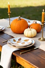 Autumn Table Setting with Pumpkins and Candles