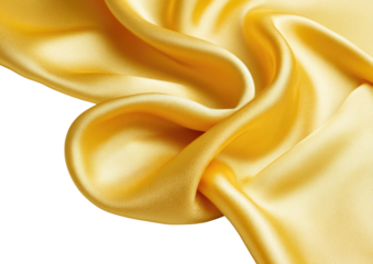 Flowing, golden fabric drapes elegantly over dark backdrop