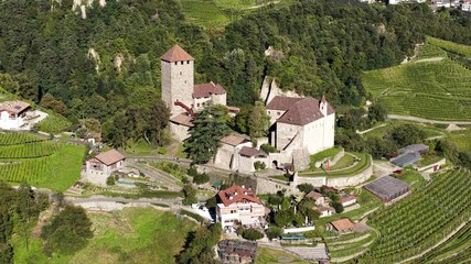 Tyrol Castle Schloss Tirol or Castel Tirolo, in South Tyrol, Italy, aerial video