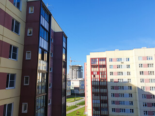 Affordable housing, apartment buildings. City apartments with balconies. Multi-story buildings, purchase, rental of real estate.