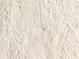 Close-up of a plastered wall, concrete wall surface, beige plaster.