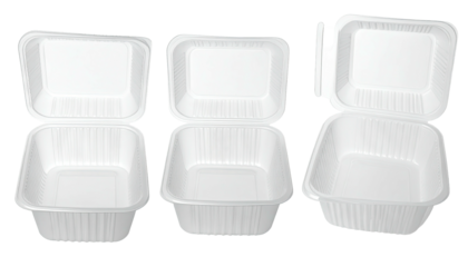 Three empty, white, hinged food containers with a ridged texture, open
