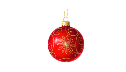 A shiny red ornament with gold swirls and flower on a black background