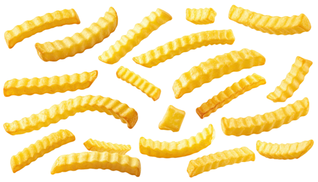 Golden, crinkle-cut fries scattered across a black background, isolated