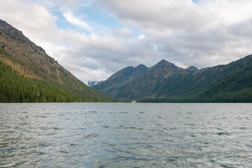 Landscape view of Lower Multinskoye lake in late august, glacial lake in the Altai mountains, Russian Federation