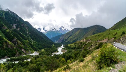 Fototapeta premium Mountain valley with river and road