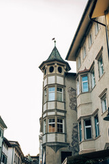 Ancient building with bay window in the historic center of Bolzano, in Northern Italy