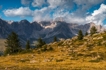 Scenic Mountain Landscape in the Dolomites, Italy. Dolomites Mountain Range. Mountain panorama with cludy sky
