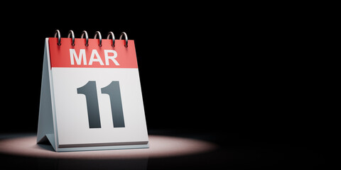 March 11 Calendar Spotlighted on Black Background