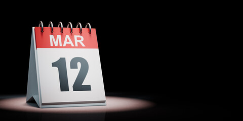 March 12 Calendar Spotlighted on Black Background
