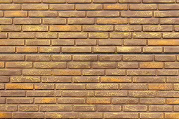 Close up of decorative fence wall with warm golden highlights. Pattern features evenly aligned horizontal bricks with textured surface. Ideal for use as seamless texture, backdrop, material reference