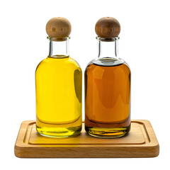 Two glass bottles of liquid, one yellow and one brown, on a wooden tray, black background