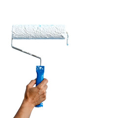 A hand holds a paint roller against a black backdrop, ready for painting a surface