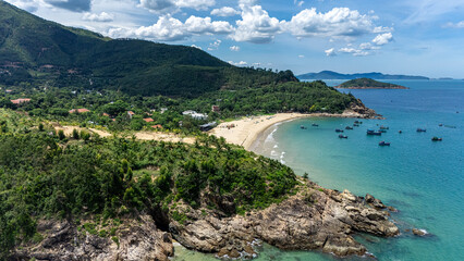Obraz premium Panoramic Aerial View of Pristine Beach Bay and Mountains, Quy Nhon Vietnam Coastline