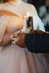 Candle lighting ceremony during a wedding celebration at a beautiful venue