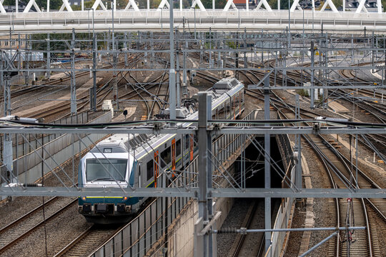 Overhead view of train lines and infrastructure in Oslo, Norway, highlighting the complexity of modern transport, connectivity and efficient urban engineering