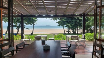 tables in a beachfront restaurant