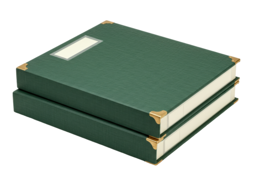 Isolated stack of two hardcover green books with gold corner protectors and label window, lying flat