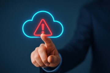 Fototapeta premium Alert Icon in Cloud with Warning Symbol and Businessman Finger Touching Digital Interface Concept