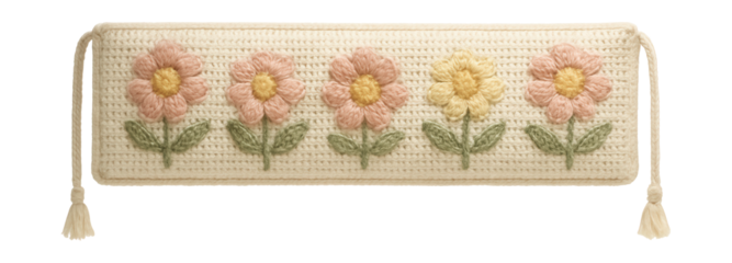 Handcrafted crochet crib bumper featuring floral designs for a cozy nursery.