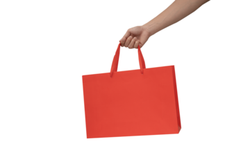 A clean, high-resolution studio shot of a hand holding kraft paper shopping bag with twisted rope handles, isolated on a pure white background. The horizontal orientation of the bag provides excellent