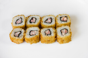  Fried sushi rolls with tuna in close-up