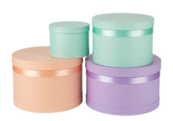 Isolated pastel hat boxes stack for flowers or gifts, lavender, green, peach, no background