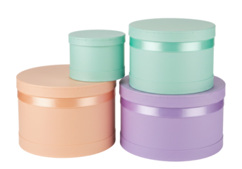 Isolated pastel hat boxes stack for flowers or gifts, lavender, green, peach, no background