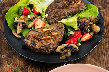 Served roasted beef meat steak.
