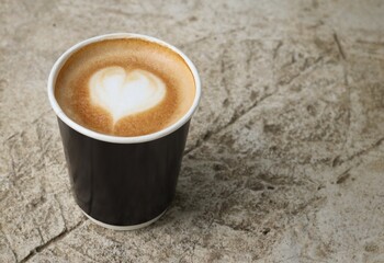Heart latte art in coffee cup