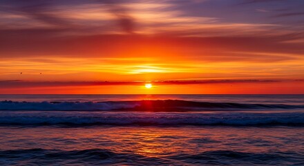Fototapeta premium Vibrant Ocean Sunset with Fiery Sky and Reflective Water.