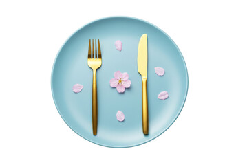 Isolated aqua dish with gold cutlery and pink blossoms, elegant table setting for design
