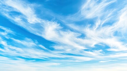 Sky Serenity: A mesmerizing display of ethereal clouds dances across a vibrant, clear blue sky, creating a sense of boundless freedom and tranquility.