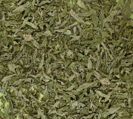 Close-up of dried mint leaves for herbal tea and spice preparation, organic aromatic herbs background, natural green texture for culinary and wellness concepts
