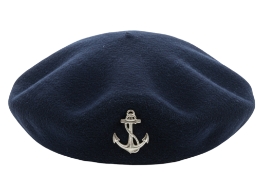 Isolated Navy blue beret with silver anchor emblem on plain studio background for use