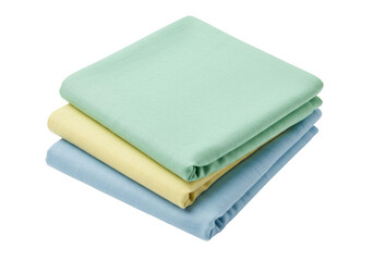 Isolated stack of three folded pastel cloth napkins or towels ready to use in hotel laundry
