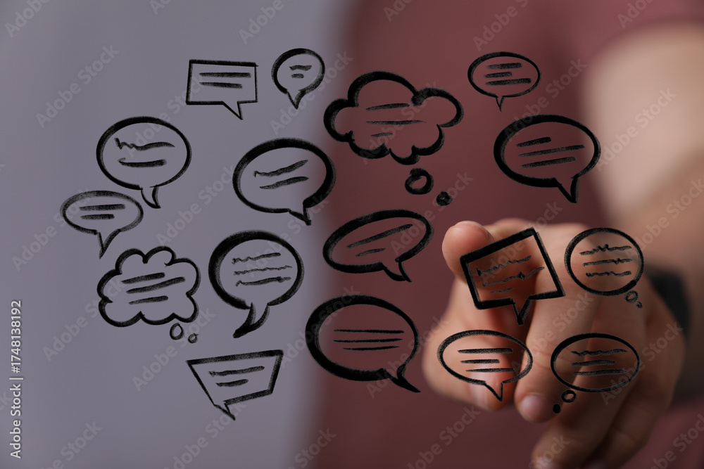 Wall mural conceptual communication background featuring hand pointing at message bubbles, symbolizing social m