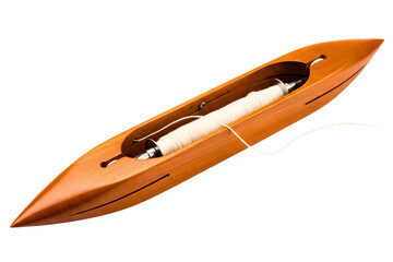 Classic wooden boat shuttle with a spool of white thread for a loom isolated with transparent background