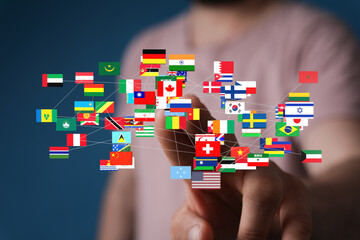 Image of interconnected world flags, symbolizing global business, communication, and collaboration.
