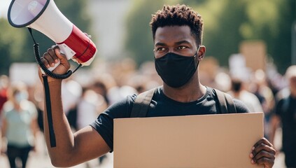 Young activist with a megaphone and blank sign at a protest. Man in a face mask leading a crowd at a public demonstration. Social movement and civic engagement concept