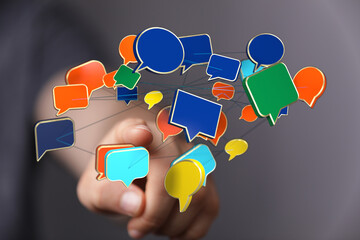Digital communication concept. Colorful speech bubbles connected, symbolizing networking and social media engagement. Business communication met