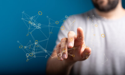 Abstract image of a hand interacting with a digital network.  Perfect for technology, connection,...